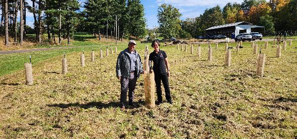 two people in field